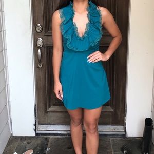 I am selling a mini turquoise dress!